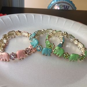 Bundle of 3 bracelets elefant and flower.
